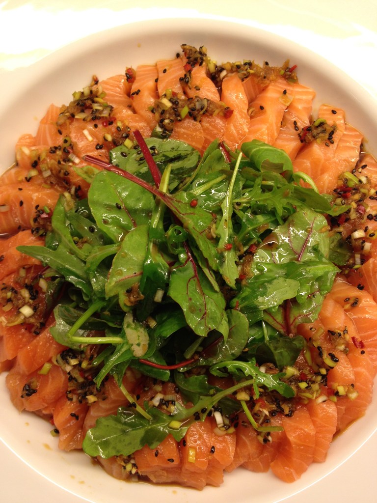 Sashimi with green leaves