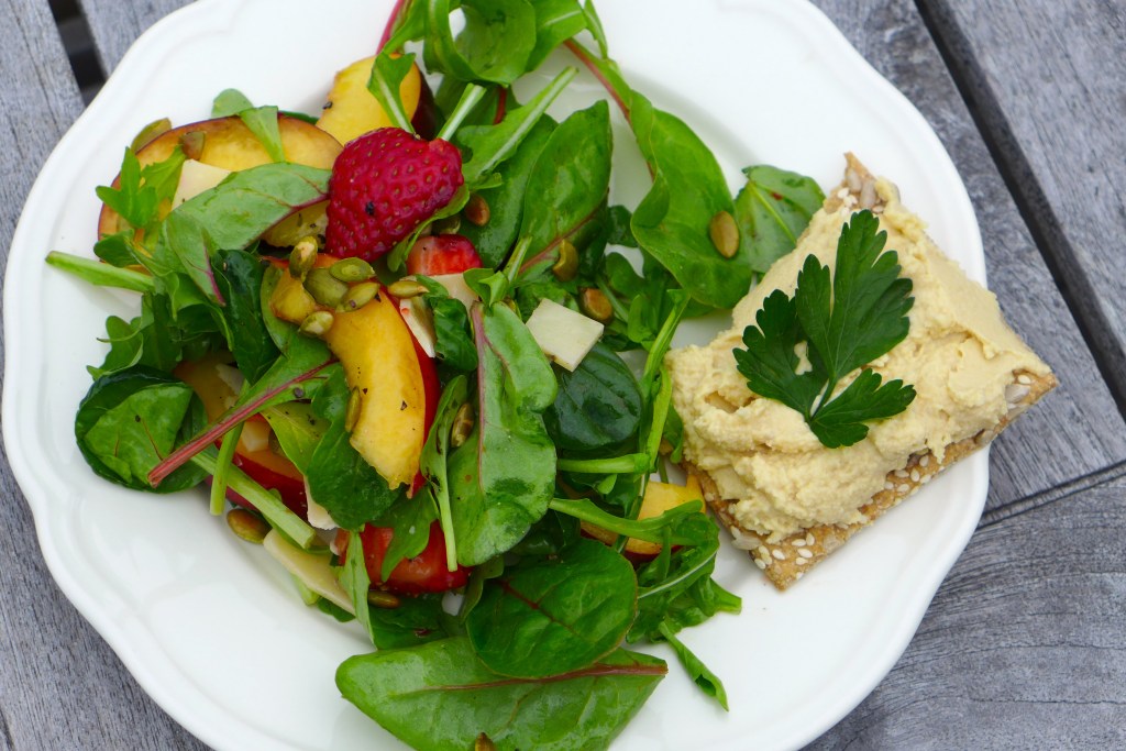Salad, crisp bread and hummus